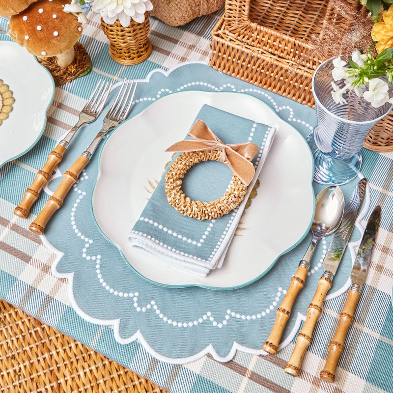 Four placemats showcasing charming Mariana Duck Egg shades.