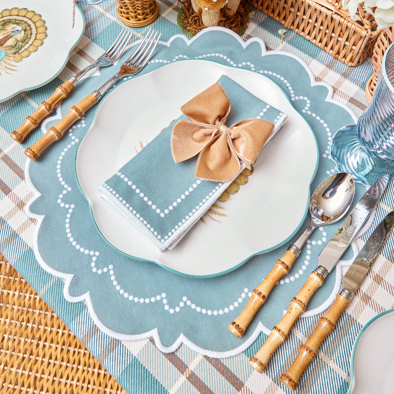 Set of 4 placemats and napkins in delightful Mariana Duck Egg hues.