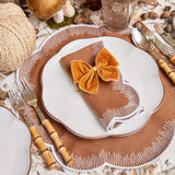 Add a touch of opulence to your dining experience with these Mustard Velvet Napkin Bows.
