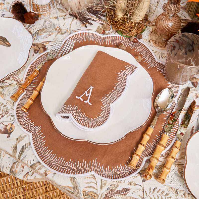 Embrace chic dining with Alathea Caramel Linen Napkins.