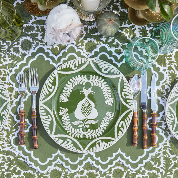 Set of four elegant placemats featuring a Scarlett Green & White palette.
