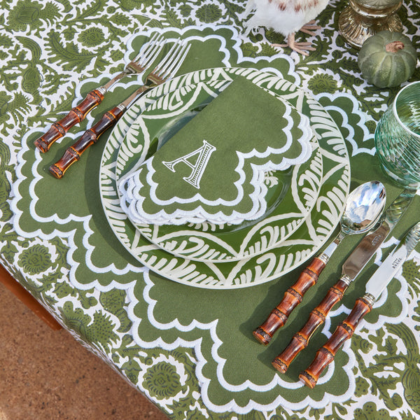 Coordinated set of 8 plates, featuring charming olive and pomegranate designs.