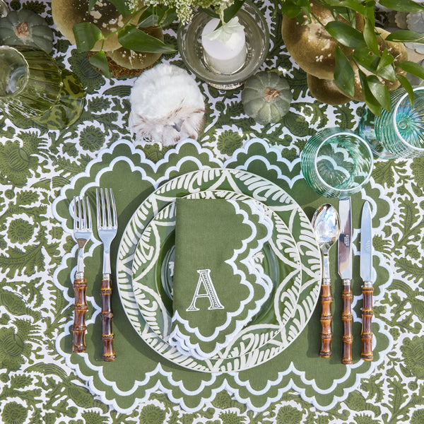 Set of 4 placemats and napkins featuring a charming Scarlett Green & White color scheme.