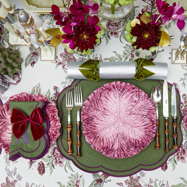 Create a visually stunning tablescape with Eloise Green & Purple Placemats, a set of 4 that harmoniously blends two captivating colors.