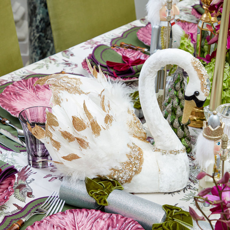 Elevate your home decor with the Gloria Glitter Swan, a majestic swan sculpture adorned with glittering accents that radiate sophistication.