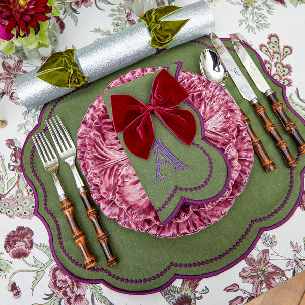 Elevate your dining experience with the Eloise Green & Purple Placemats & Napkins Set, a delightful combination that adds charm and color to your table settings.