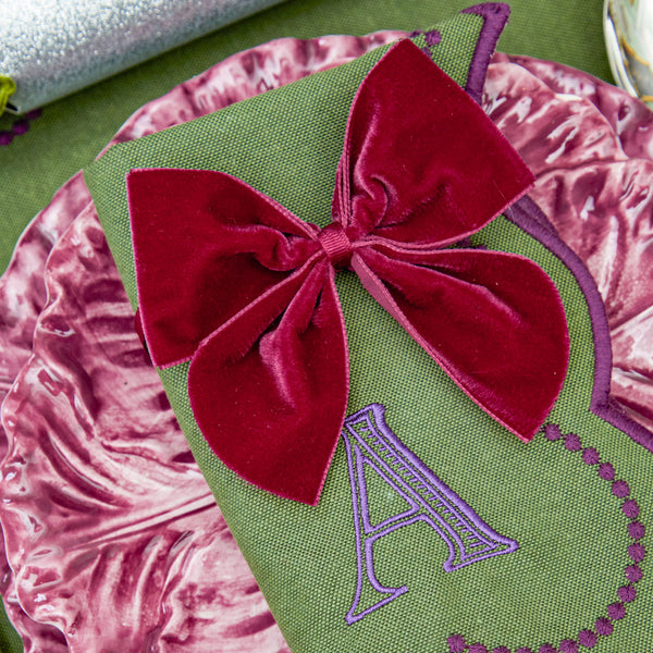 Add a regal touch to your dining experience with Aubergine Napkin Bows.