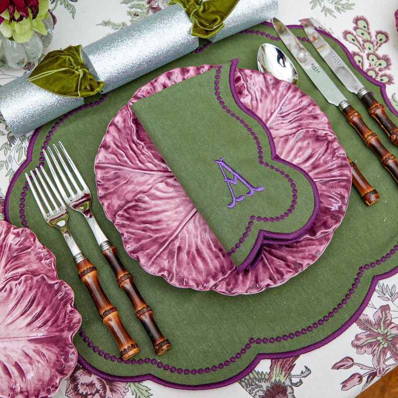 Create a captivating tablescape with Eloise Green & Purple Napkins (Set of 4), enhancing your dining settings.