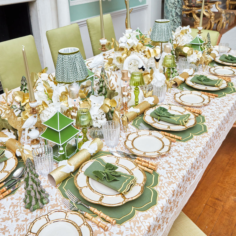 Set a tranquil and elegant table with the Silent Night Tablecloth, adorned with a serene winter scene that captures the beauty of a silent, snowy night.