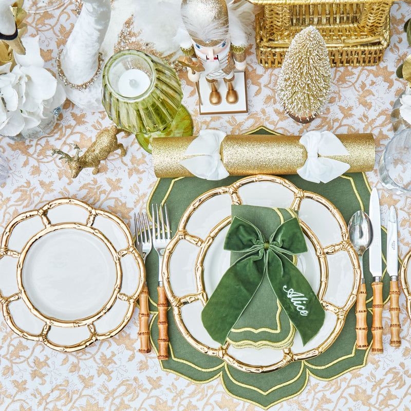 Elevate your dining ambiance with the timeless beauty of gold petal adornments, courtesy of the Gold Petal Bamboo Ceramic Starter Plate, perfect for exuding a sense of refinement and opulence.