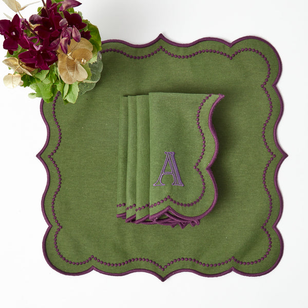 Elevate your dining experience with Eloise Green & Purple Napkins (Set of 4), adding a pop of color and elegance to your table.