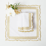 Elevate your table setting with the White & Gold Laurel Napkins - a set of four that adds a touch of timeless beauty and sophistication to your dining experience.