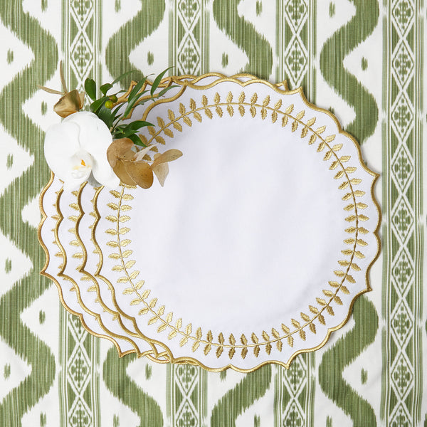 Elevate your table setting with the White & Gold Laurel Placemats - a set of four that adds a touch of sophistication and elegance to your dining experience.