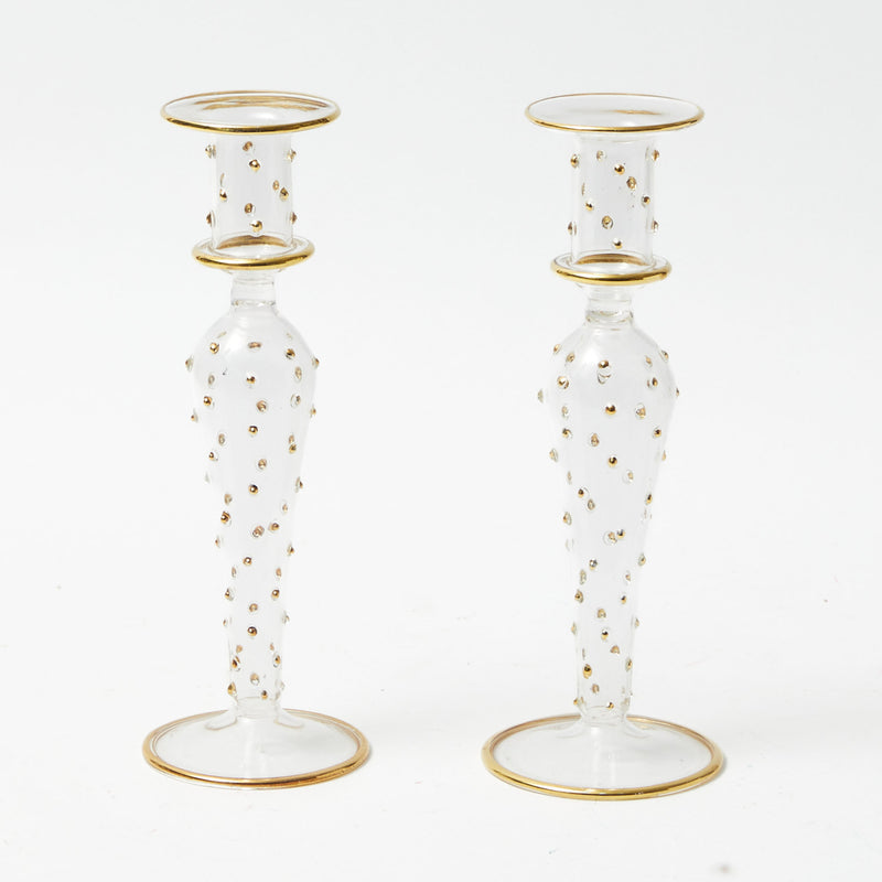 Upgrade your home decor with the Dotty Gold Candle Holder Pair - the epitome of gold and stylish design.
