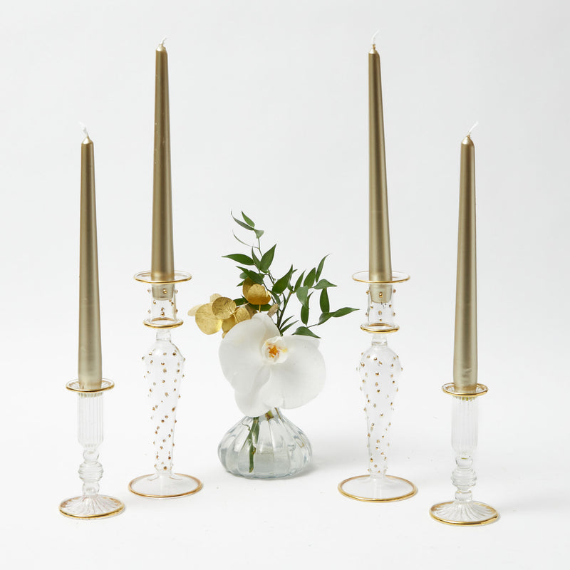 Elevate your decor with the elegant beauty of our Pair of Dotty Gold Candle Holders - a simple yet luxurious statement of candlelit sophistication.