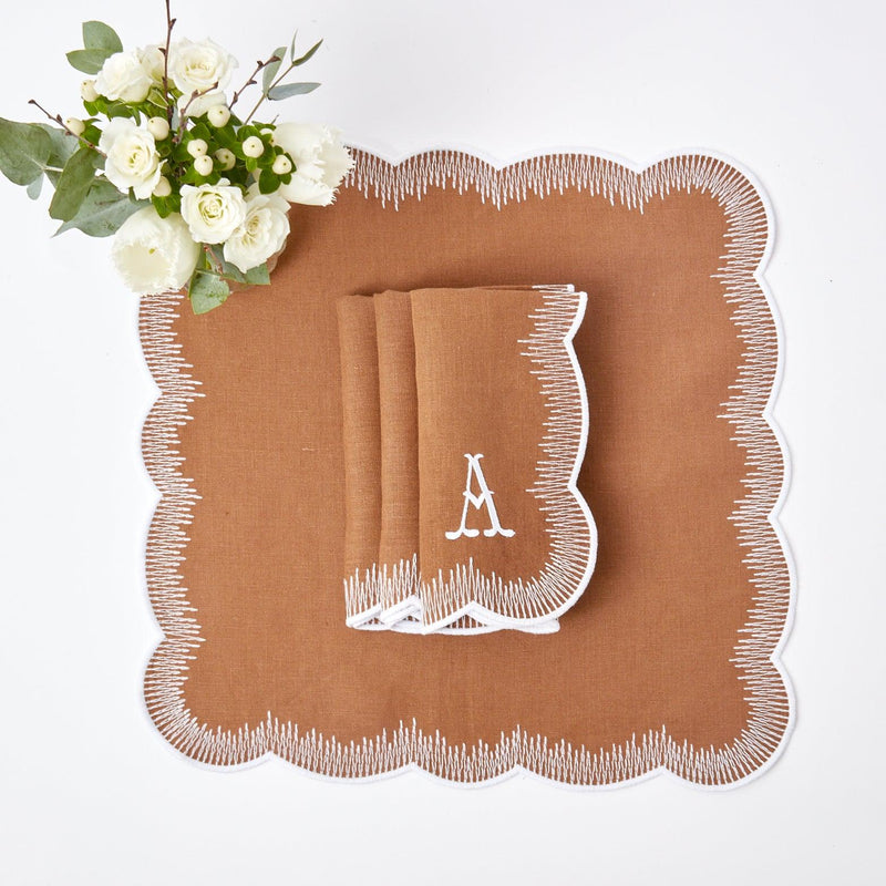 Enhance your dining decor with Alathea Caramel Linen Placemats & Napkins.