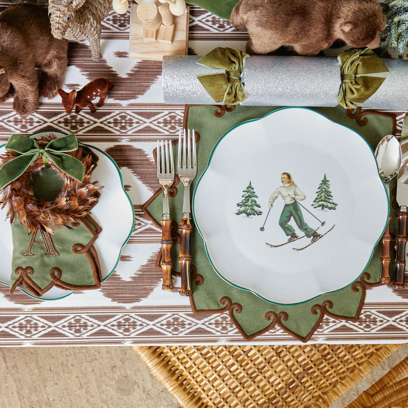 Heidi & Hans Skier Dinner & Starter Plates (Set of 8) add a touch of Swiss charm to your dining.