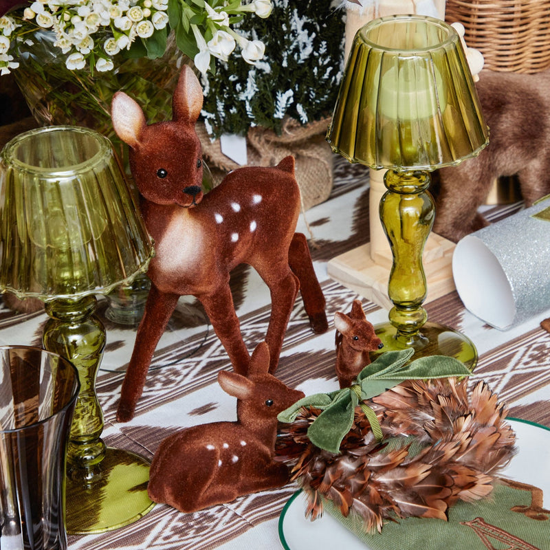 Bring the forest to your tabletop or shelf with the Mini Brown Bambi (Set of 4). Their small stature adds a dash of nature's grace to any corner.