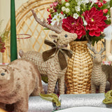 Make your home feel like a cozy cabin with the Rattan Reindeer Family.