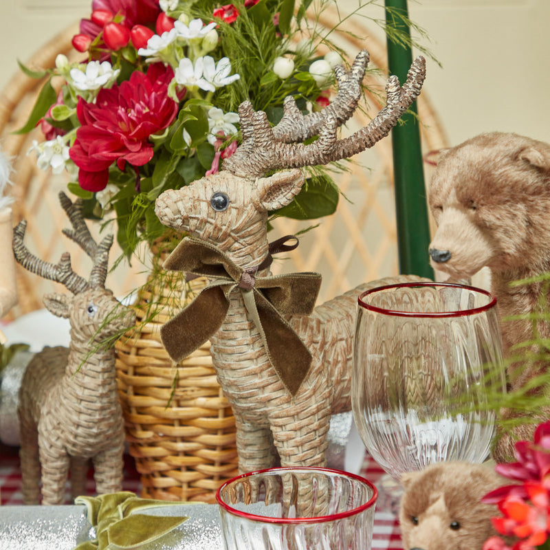 Elevate your Christmas decor with the rustic beauty of our Pair of Rattan Reindeer - a tribute to the timeless elegance of holiday charm.