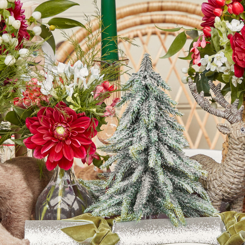 Elevate your holiday ambiance with the Frosted Fir Tree Pair, perfect for creating a snowy and enchanting atmosphere in your home.