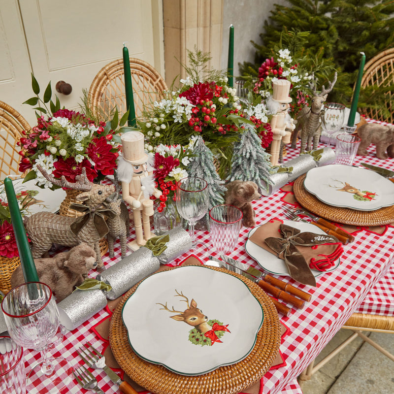 Add a touch of timeless Christmas style to your holiday table with the Red Rim Wine Glass Set.