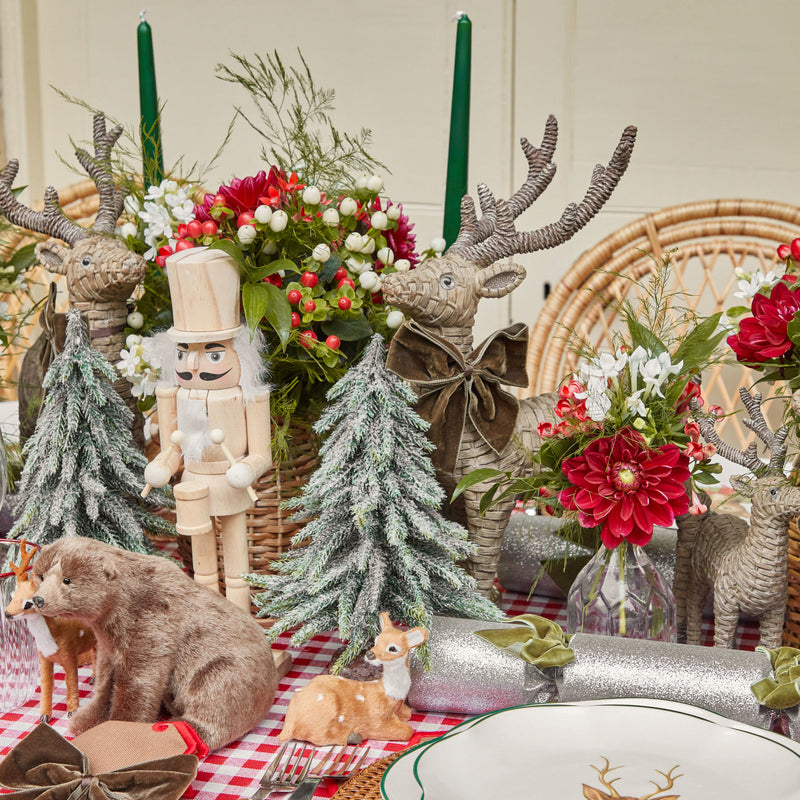 Transform your space into a holiday haven with the Large Rattan Reindeer Pair.