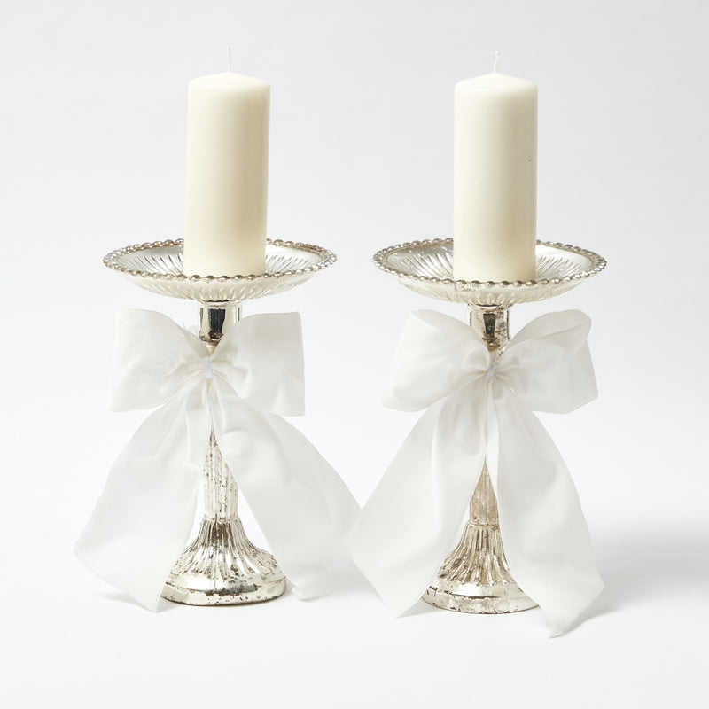 Celebrate the beauty of mercury with our Large Mercury Pillar Candle Stand Pair, a must-have for any elegant gathering.