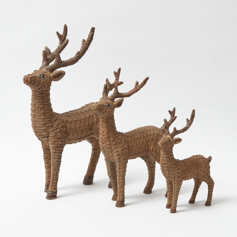 Add a touch of distinctive style to your holiday decor with the Rattan Reindeer Pair, perfect for creating a unique and inviting Christmas atmosphere.
