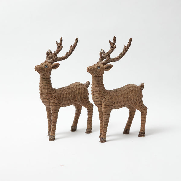 Delight in the whimsy of these Mini Rattan Reindeer decorations.