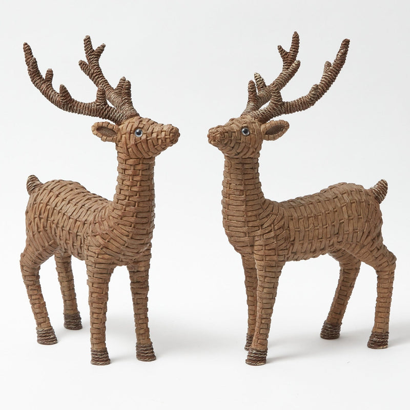 Welcome guests with the warm and inviting presence of these Large Rattan Reindeer.