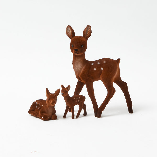 Add a touch of woodland charm to your decor with the Brown Bambi Family, a trio of adorable deer figurines that bring the beauty of nature indoors.