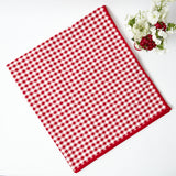 Set the stage for a timeless and festive feast with the Berry Red Gingham Tablecloth, a classic addition that adds a touch of traditional charm to your table.