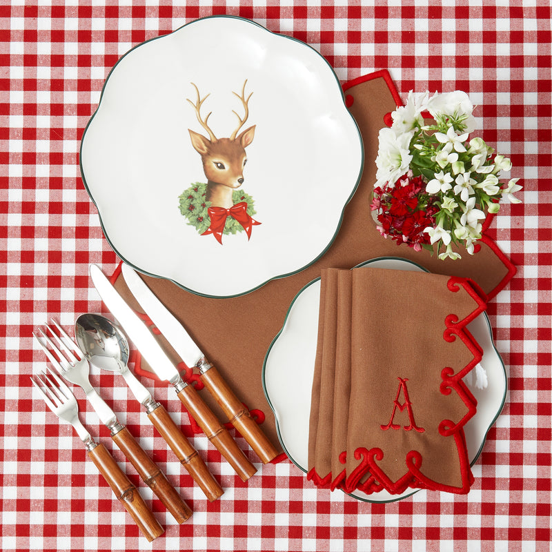 Brighten your dining table with the whimsical presence of the Bambi Scalloped Dinner Plate, ideal for creating an elegant and enchanting atmosphere that embodies the magic of Bambi.