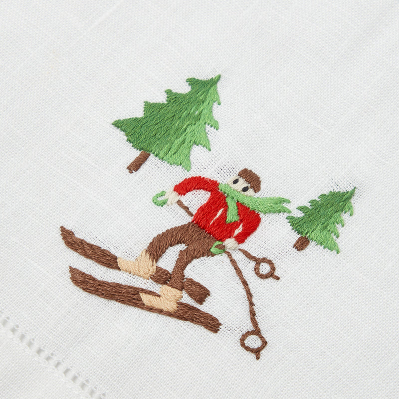 Create a cozy and winter-inspired atmosphere in your bathroom with the Embroidered Skier White Linen Hand Towel, perfect for setting the stage for a seasonally delightful experience.