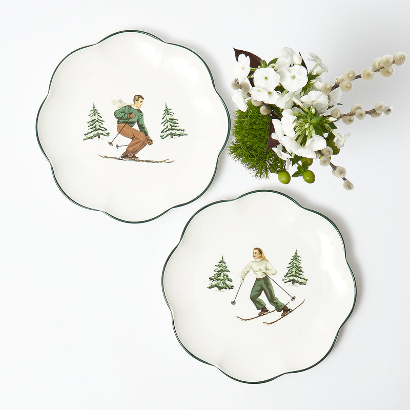 Elevate your Christmas decor with the whimsical and enchanting beauty of the Heidi & Hans Skier Starter Plates - a simple yet stylish statement of holiday sophistication.