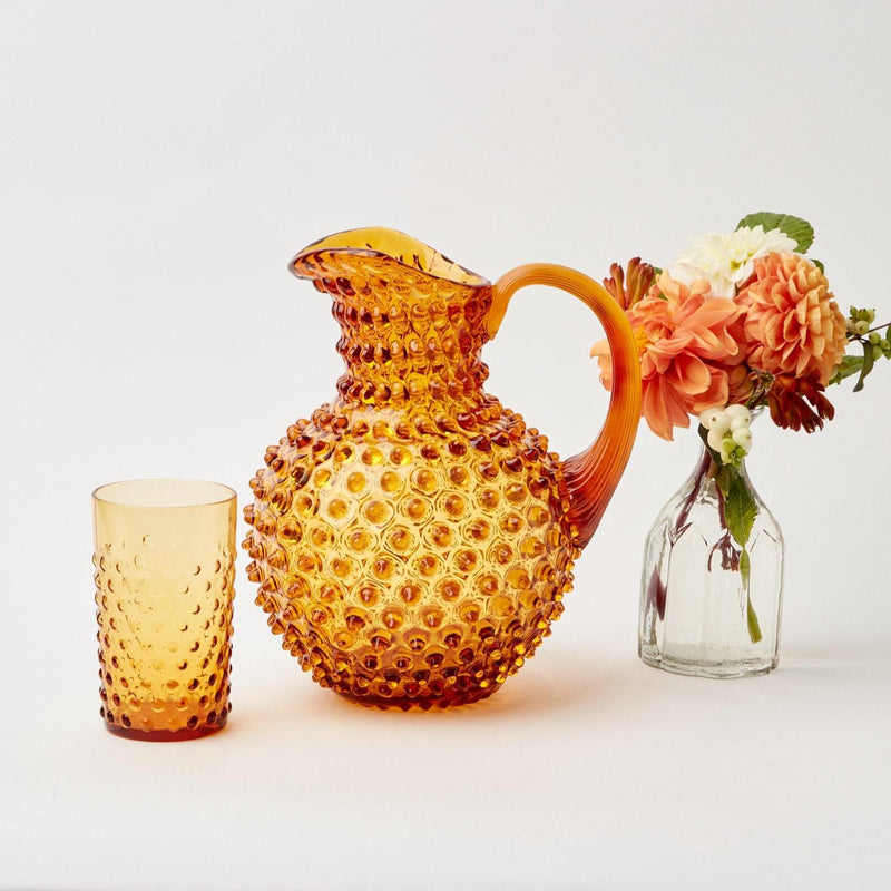 Elevate your beverage service with the Amber Hobnail Jug, a classic piece that stands out in any setting.
