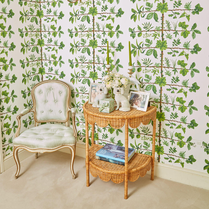 Create a cozy atmosphere with the Annabelle Rattan Side Table, designed to infuse your space with a touch of fresh charm and botanical grace.