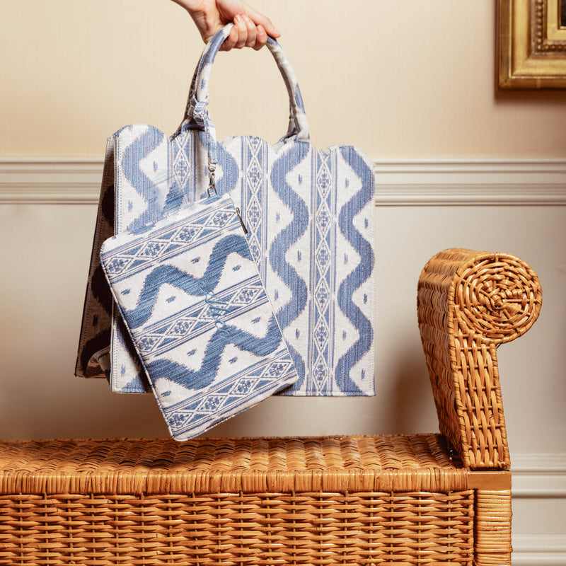 Make every outfit a fashion-forward experience with the Blue Ikat Pochette, a piece that infuses your look with the beauty and versatility of Ikat-inspired designs.