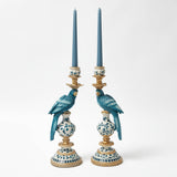 Enhance your decor with the Blue Parrot Candle Holder (Pair) - a unique and exotic touch to your space.