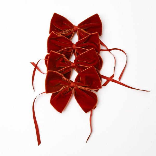 Enhance your table with a pop of color using Burnt Orange Napkin Bows (Set of 4).