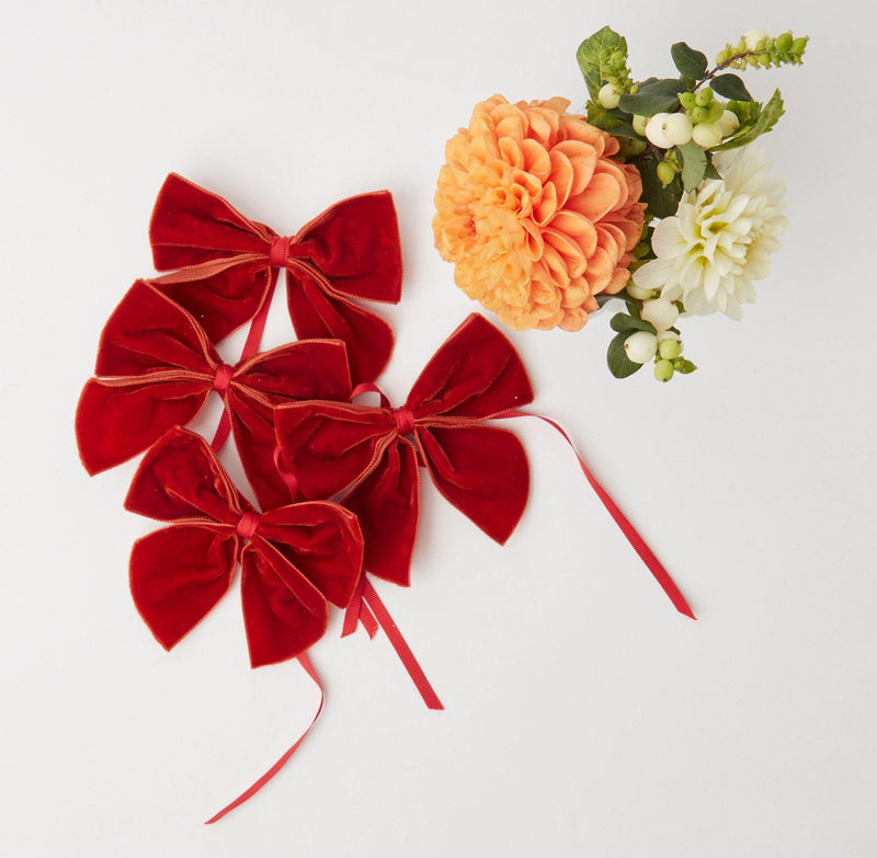 Set a welcoming table with the inviting glow of Burnt Orange Napkin Bows (Set of 4).