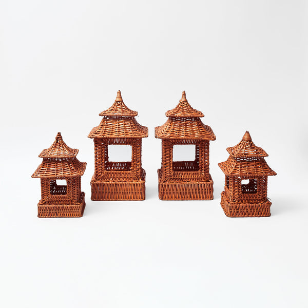 Pagoda-inspired set crafted from burnt rattan material.
