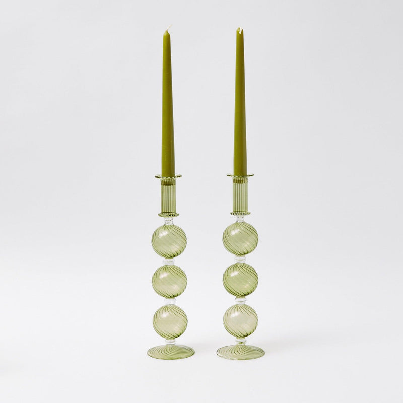 Illuminate your Christmas decor with the Camille Olive Candle Holder Pair - a charming addition to create a warm and inviting holiday atmosphere.