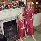 Make their bedtime special with the Children's Red Tartan Frilled Dressing Gown - a delightful choice for adding a dash of classic comfort to their evenings.