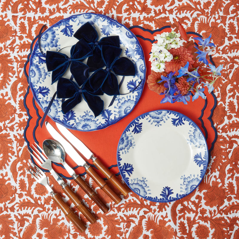 Coordinated set of elegant Blue Deauville starter plates, totaling four.