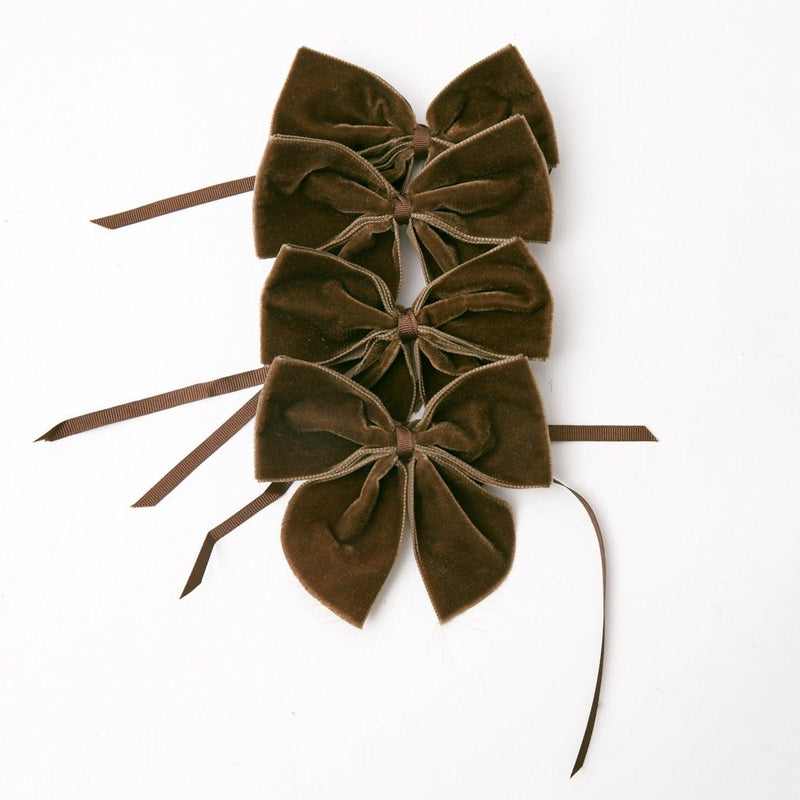 Mrs. Alice adds a touch of elegance with Chocolate Brown Napkin Bows (Set of 4).