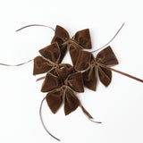 Mrs. Alice's stylish touch: Chocolate Brown Napkin Bows (Set of 4) in action.