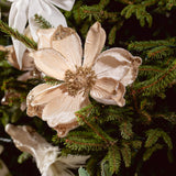 The Clip On Champagne Flower Ornament adds a touch of shimmer to your holiday decor.