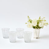 Add a touch of enduring style to your table setting with our set of 4 Dappled White Water Glasses.